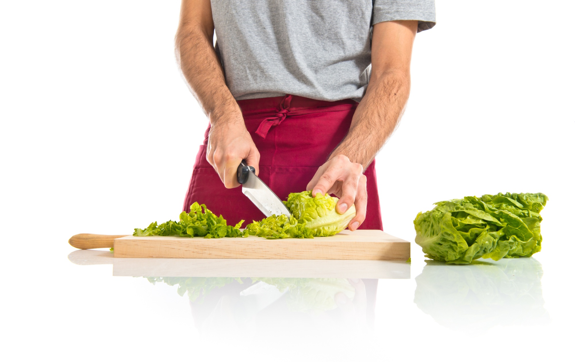 Student chopping vegetables